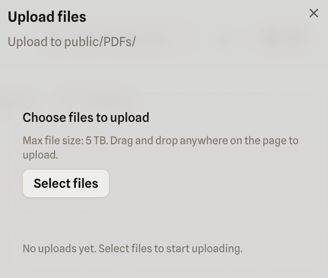 Upload files panel showing the public/PDFs/ destination, maximum file size, Select files button, and an empty upload queue.